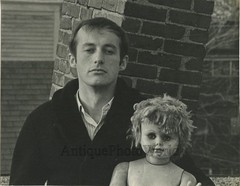 Folk musician with doll strange vintage art photo by Julie Snow