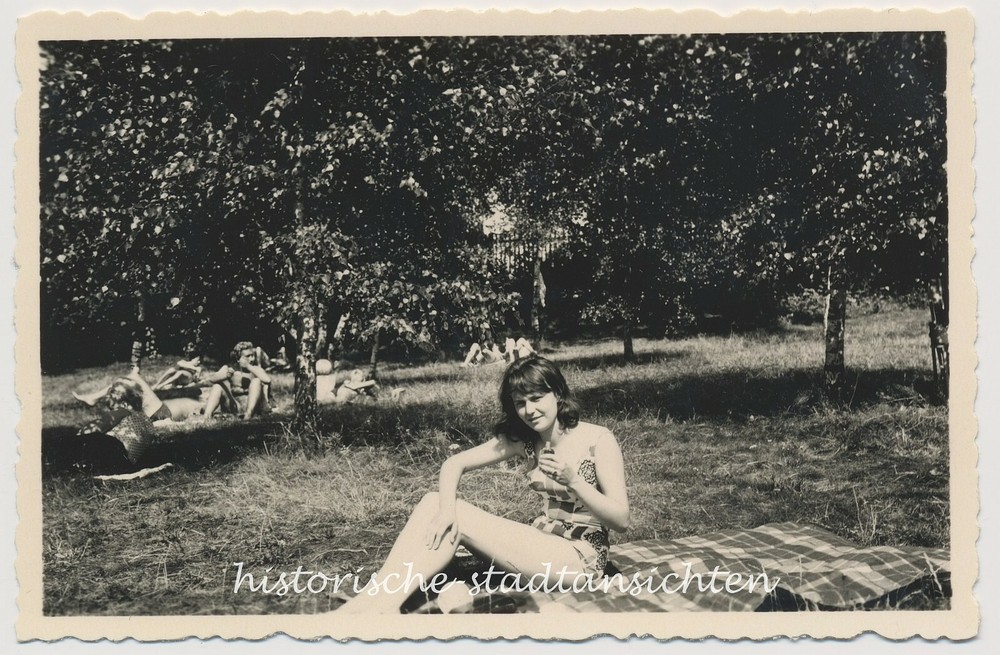 Young woman sunbathing lake – GDR stamped Löbau – old photo 1950s 1960s