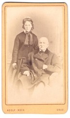 Photography Adolf Koch, Graz, Sackstrasse 31, Elegant Couple with Armchair