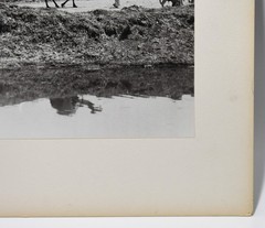 J.W. Howlett Black + white Photograph focusing on a Group of Travelers W/ Camel