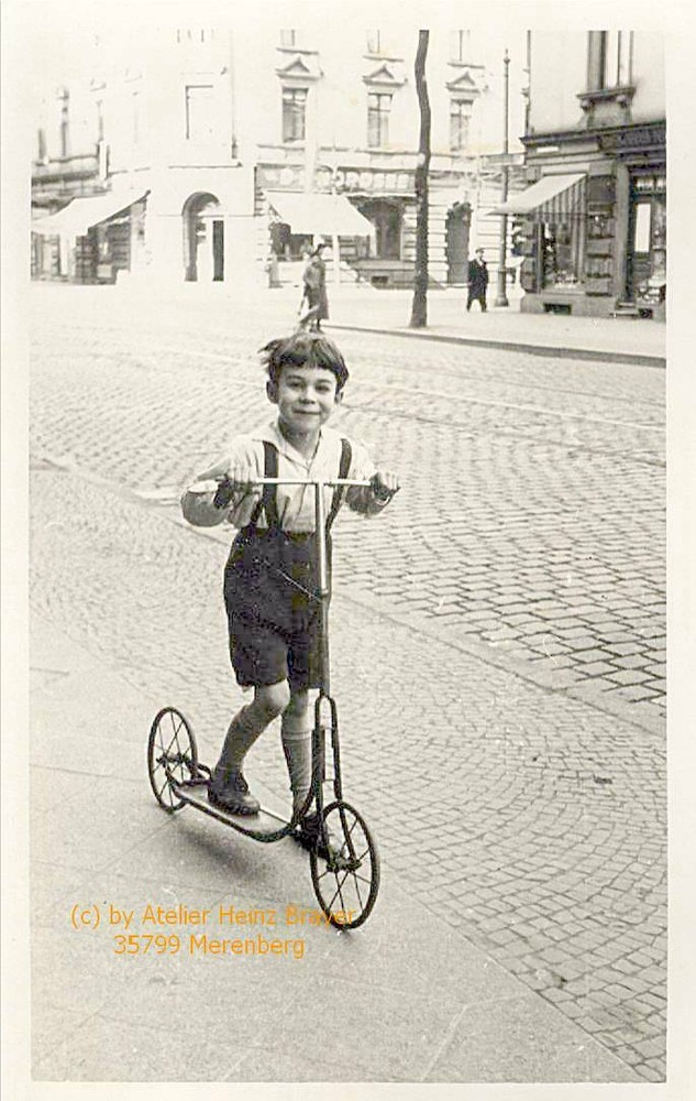 Vintage, boy, very proud with the new scooter, photo: around 1920 -1930, DIN A 4,