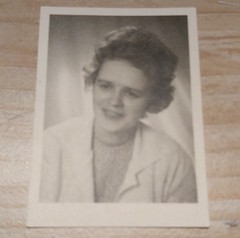 small old b/w photo passport photo young woman