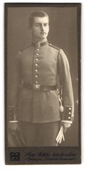 Photograph Max Höfele, Munich, Dachauer Str 25, soldier in uniform holding umbrella