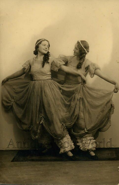 Pretty dancing girls in great costumes antique photo