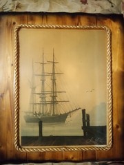George E. Lee photo of fishing boat coming to port, seagulls,