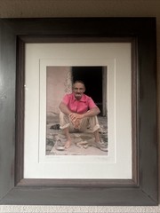 A signed photographic portrait of a man in Trinidad, Cuba. By David Simchock