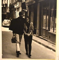 J.W. Howlett Black + White Photograph Focusing on a Man + Woman in an Urban Area
