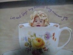 1997 Anne Geddes, BABY IN A TEA CUP 5 x 5 inch Picture Framed