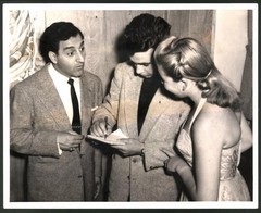 Photography Night Club Entertainer Danny Thomas gives autograph to Yvonne Stein,