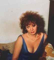 Nan Goldin, self-portrait in blue dress NYC 1985, pigment print, autographed