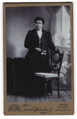 Photograph Arnold Hirnschrodt, Ried, Young Lady in Dark Dress with White Ros