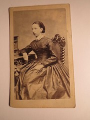 Uster 1866 Josephine von Grebel? as a sitting woman in crinoline – backdrop / CDV