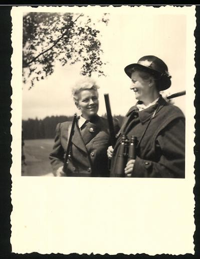 Photograph Two Female Hunters with Shotgun and Binoculars