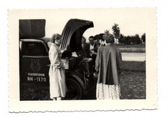 Photo Old Woman on Vintage Electrical Engineering RH – 1170 Vehicle
