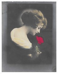 Antique 6-7/8”x 8-7/8” Color Photograph of a gorgeous Brunette holding a Red Ros