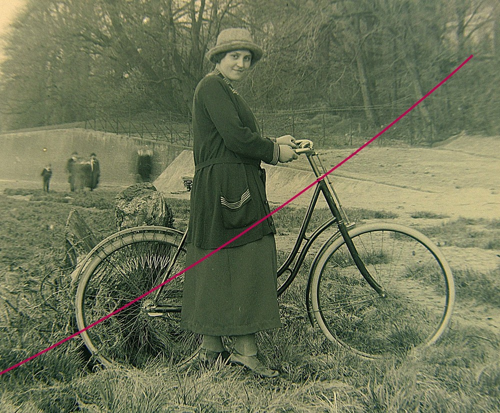 Bicycle driver woman with bicycle historical glass negative around 1920