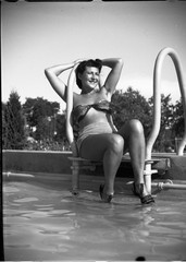 pretty woman smiling in swimsuit, strand, Budapest, by Szendrő (Szendro), origin