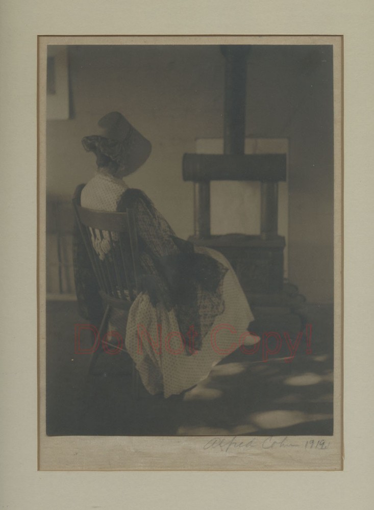 Woman resting by fireplace antique framed art photo by Alfred Cohn