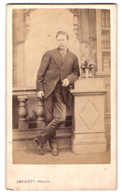 Photograph Drewett, Guildford, 47 High Street, Man Leaning Against Decorative Balust