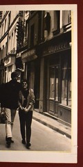 J.W. Howlett Black + White Photograph Focusing on a Man + Woman in an Urban Area