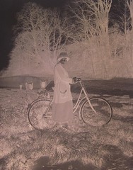 Bicycle driver woman with bicycle historical glass negative around 1920