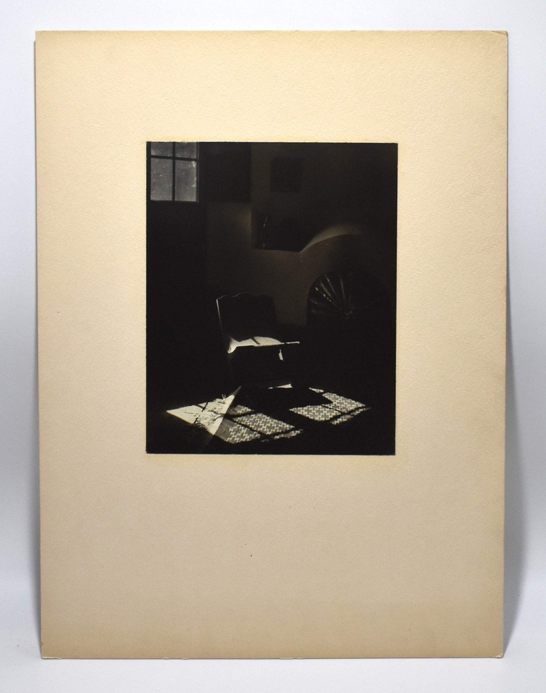 Vintage J.W. Howlett Black and White Photograph Focusing on a Rocking Chair