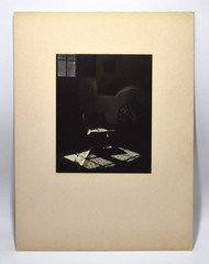Vintage J.W. Howlett Black and White Photograph Focusing on a Rocking Chair