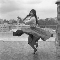 Claudia Cardinale Dancing in Dress Photo Print Poster