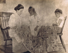 Hendrickson Orig Photo SEPIA MOTHER AND HER DAUGHTERS FINISHING UP QUILT 14×11″