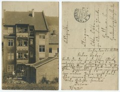 39130 – House with people on balconies – Photo as field postcard, Kahla 31.12.1917