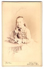 Photograph Rob. Cox, Weston-super-Mare, Portrait of a Child with Basket of Flowers