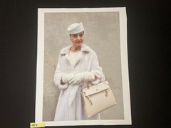 This is a 16×24 Portrait of a woman in a white coat with a purse