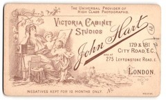Photograph John Hart, London, Photographs with Two Elves Looking at a Photogr