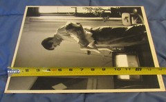 1977 Sandy Underwood photograph; man holding child, 11″ x 14″