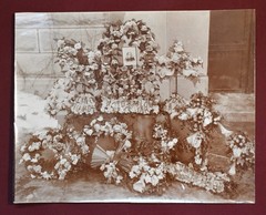 Antique Photograph Depicting a Woman’s Memorial with a Floral Arrangement