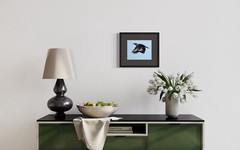 Color photographic print of a Pileated woodpecker in full flight (8×10)