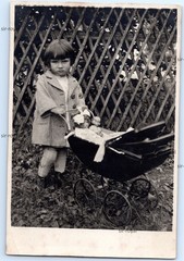 Skeptical Little Girl with Dolls Pram Circa 1930 – Photo 9x12cm