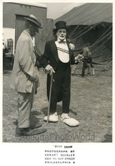 Sad clowns smoking cigar vintatge circus art photo by Edward Quigley