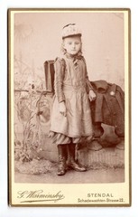 CdV photo child with satchel jacket medal Stendal around 1900 (c1145)