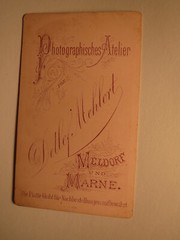 Small child standing next to a chair/CDV Detlef Mehlert Meldorf and Marne