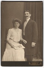 Photograph Th. Eppler, Dresden, Hauptstr. 24, sitting woman with book standing next to