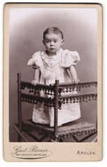 Photograph Gustav Bauer, Apolda, little girl standing in dress on a chair