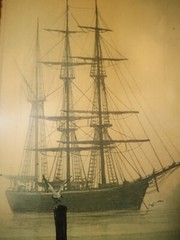 George E. Lee photo of fishing boat coming to port, seagulls,