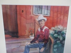 Matted Photograph of a Painting of a Cowboy