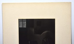 Vintage J.W. Howlett Black and White Photograph Focusing on a Rocking Chair