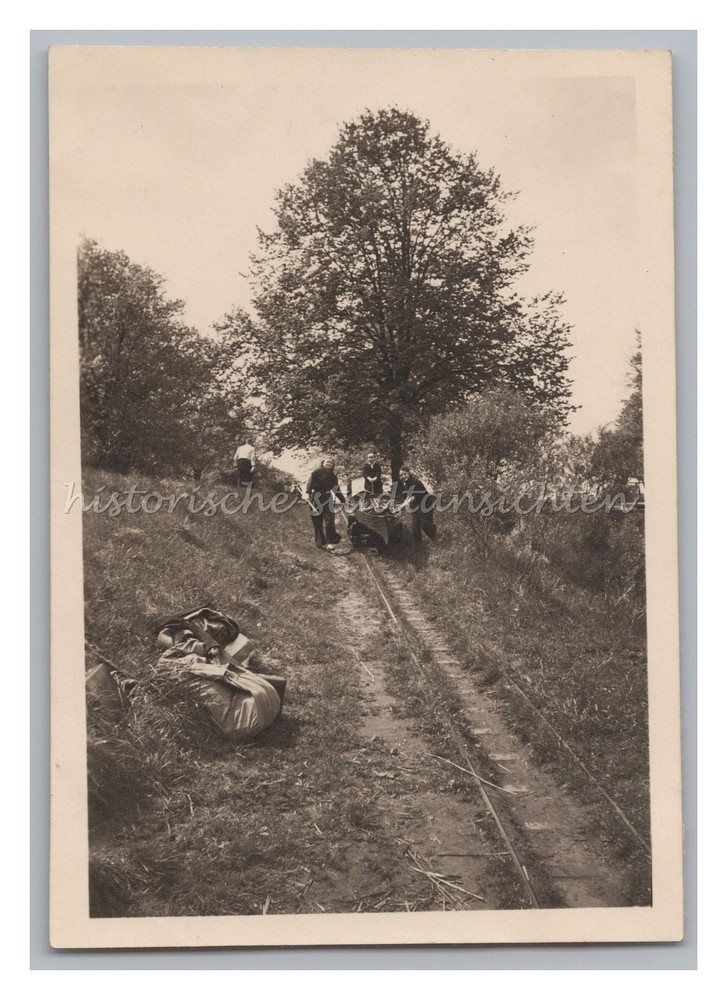 People let boat on rails water – rowing boat leisure – photo 1940