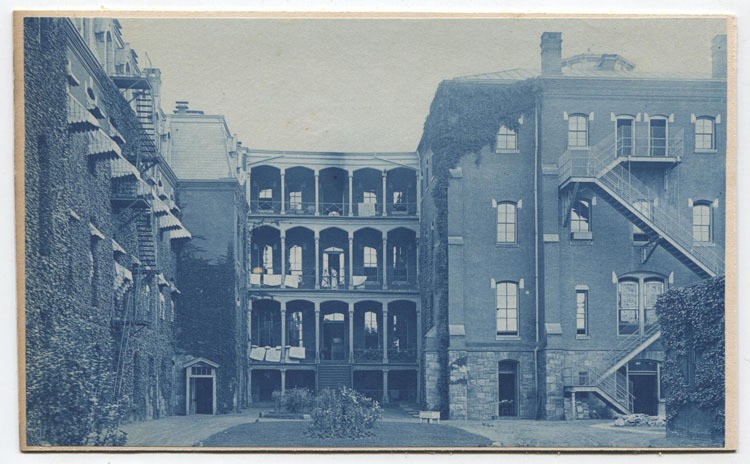 CYANOTYPE ARCHITECTURAL BUILDING WITH PORCHES. STRONG CONTRAST.