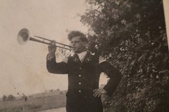 Great old photo man from the music corps with long trumpet? 1930s-40s