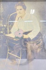 Woman Holding a Flower Colorized Photo Framed