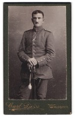 Photograph Carl Deiss, Waldshut, portrait sergeant holding sword with Portepee